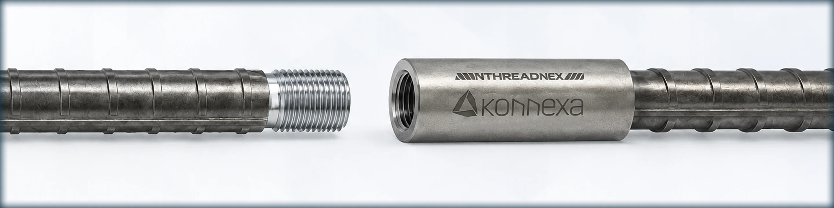 ThreadNEX mechanical rebar coupler joining two threaded bar ends